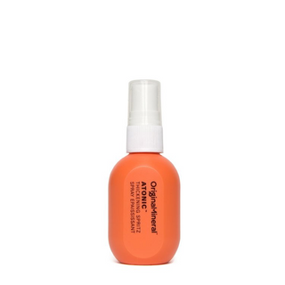 Orange spray 50ml bottle with white spritz nozzle on a white background